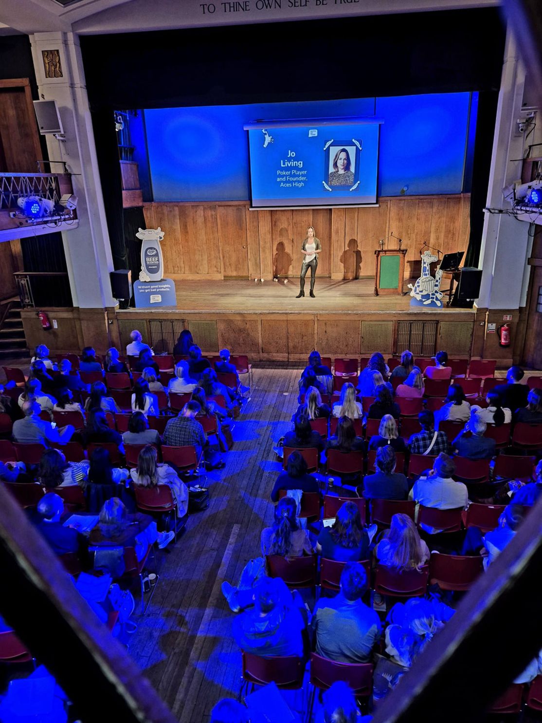 Jo Living speaking on stage